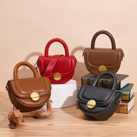 https://ae01.alicdn.com/kf/Sd333e9efc39a48a0bdc0e1a3a253c71fv/Handheld-Saddle-Bags-Half-Moon-Women-s-Wide-Shoulder-Strap-Bag-New-Tide-Niche-Design-Advanced.jpg